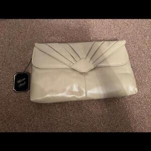 Elegance Folded: Vintage Foldover Clutch – Timeless Style, Timeless Beauty